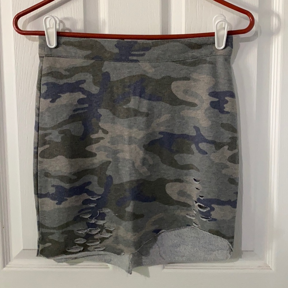 Distressed camo mini skirt